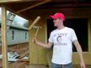 C-Tina takes an axe from joe and starts to throw it around