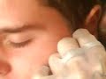 haciendome el pirsin en el tragus