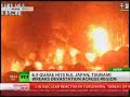 Burning oil refinery plant after earthquake in Japan