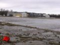 The Red River is expected to crest this weekend in North Dakota. But already, some of the region's farmland is under water after smaller rivers, swollen with melting snow, overflowed. (March 19)