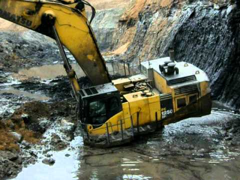 komatsu - A short video of a Komatsu PC1250 Excavator getting stuck in coal mine pit during my site visit to a coal mine.The skillful operator wriggled it out in a few...