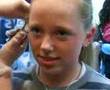 Emma getting her ear (cartilage) peirced.