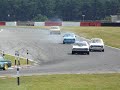 racing escorts and a bmw 2002