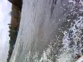 Alex pulling Sam wakeboarding