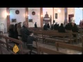 Iraqi Christians bury their dead