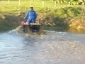 hondat atv going though 1ft deep water