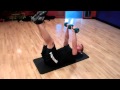 Weighted Toe Crunch - Lay on your back with your legs straight up and perform 20-25 crunches towards your toes while holing weight over-head. Complete 3-4 sets.