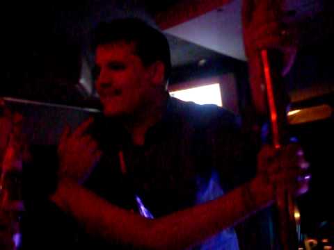 Brother pole dancing on bus