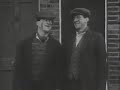 From Harry Enfield's Television Programme, Series Two. Mr Cholmondeley-Warner An early 20th century television presenter (played by Jon Glover) who, with his manservant Greyson (Enfield), would attempt to uphold the British Empire's values by advising, amongst other things, that women refrain from participating in complex conversations (as this would lead to insanity) or that babies be given gin (to ensure a good night's sleep). The characters also appeared in a series of TV adverts for Mercury Communications