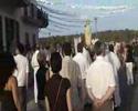 La Virgen del Carmen dirigiéndose, desde la Iglesia, a embarcarse en la barca, para iniciar la procesión de barcas por mar en 