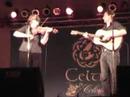 filmed by sam ruest. what can you say about perfection??? i think she has 6 fingers on her left hand. they are on the top of the heap. 
support the artists. visit liz carroll and john doyle's web site