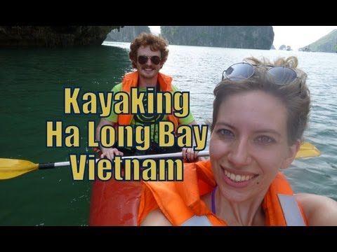 Kayaking along scenic Ha Long Bay, Vietnam Kayaking along scenic Ha Long Bay, Vietnam