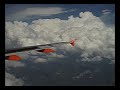 thunderstorm clouds over the alps on the beautifully smooth easy jet flight from nice to geneva on july 17, 2004. the second part shows the beginning of the descent, flying around nice looking cbs.