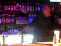 Sexy hunky barman flairing at O´neill´s bar Tenerife