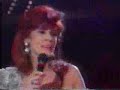 this has been made by : http://www.freewebs.com/eurovision-ireland

linda martin in esc 92'..she ended up winning the contest with her song ''why me?''