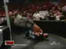 John Morrison executing a corkscrew moonsault off the barrier on Tommy Dreamer at a recent edition of ECW