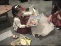 gabi girl opening presents on christmas 2007.

presents, in order of appearance:
american girl outfit (for baby doll)
books
annabelle's jingly bear
wagon
cooking utensils and play food
tricycle
suitcase
quilt
daddy's heart (model)
doctor kit (with stethoscope)

thank you!
