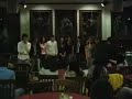 dartmouth college's christian a cappella group, x.ado, performing a skit dedicated to the 2008 seniors at their senior show in collis cafe.