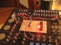 ATMega16 using interrupt driven ADC with a motion sensor.