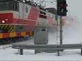 InterCity train whirling snow into air after snow storm