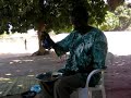 Mamady Danfa pouring Ataya (tea), Brikama Gambia