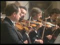 Gidon Kremer leads the English Chamber Orchestra in playing the first movement of the first concerto of Vivaldi's Four Seasons.1992.