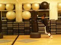 punching a standing bag to the wall. punching a standing bag to the wall.