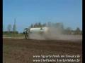 Claas Xerion z beczką Kaweco + kultywator
