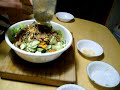 Ingredients: Lettuce- use a variety of red leaf, romaine, boston etc.,( use iceberg only if necessary) Cucumbers, red onions, tomatoes, carrots, cilantro, and any other herb that you like Dressing: Peanuts, ground beef, hard boiled egg yolk, limes, sugar, vegetable oil, shallots, fish sauce Roast peanuts in a pan, pour into a clay mortar, crush in motar with pestle, add cooked egg yolk, limes, sugar, fish sauce, ground beef, shallots, vegetable oil, mix well and pour over ingredients.