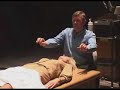 John Iams Treats Patient On Stage John Iams Treats Patient On Stage