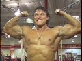 Bodybuilder Denis Sergovskiy trains biceps Bodybuilder Denis Sergovskiy trains biceps