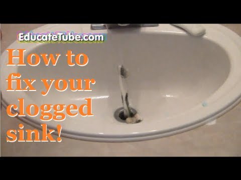 how to unclog tub with hanger
