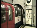 A westbound Central Line 1992 Stock train departs Liverpool Street