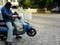 Shankar wheeling in a small bike