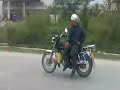 Coolest Biker Ever Rides His Bike Sideways