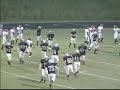 carson smith of reagan high school delivers two passes that led to the school's historic first varsity win vs. atkins