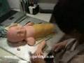 The Dismantling of Sculpted Baby Cake