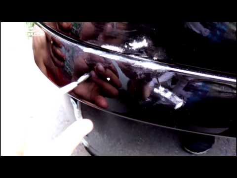 how to remove a paint scratch from a car