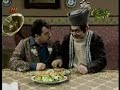 Teaching a tribal Awghan how to eat with a spoon Teaching a tribal Awghan how to eat with a spoon