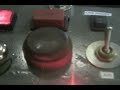 This is a can crusher I built over the summer break for the fun of it. I have wanted to build one since 10th grade but it took a few years to acquire the parts. Mostly everything was designed and built by me, I had some help from my dad getting the parts made. It uses Bimba cylinders, IDEC relays, a series one PLC, and random switches that I had. The PLC uses ultra primitive Ladder logic, it would have been 10 times easier to write the code on a TI-83. This machine could be redesigned to crush tall energy drink cans, it would just need a new can chute. I would have liked to design a better method of removing the crushed can but I ran out of ambition. It is timed right now to complete a crush cycle in 2.0 seconds. The main crusher cylinder is severely limited by the air solenoids. They do not allow for enough air flow which prevents the cylinder from getting a good snap into the can. I was considering possibly using a 1/2 inch dia. Bimba with a 1 inch stroke to toggle a manual air switch. Since the toggle switch would let much more air through, the cylinder would snap onto the can, instead of pushing slowly. Please leave design suggestions.