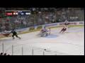 Evgeny Artyukhin runs over Dennis Seidenberg
