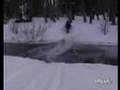 Snowmobiler Cruises Across River and Hits tree