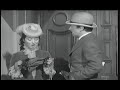 Greer Garson and Walter Pidgeon break into a house Greer Garson and Walter Pidgeon break into a house