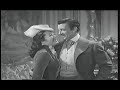 Greer Garson and Walter Pidgeon break into a house