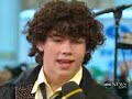 Katie and Karleigh from JonasBrothersFan.com appear on Good Morning America Extra to ask the Jonas Brothers how it felt to get a gold record.