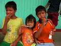Shipibo children learning to brush their teeth