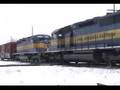IC&E 6212 west crosses the diamond in Davis Junction, IL.