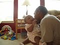 Daddy smooches Isabella