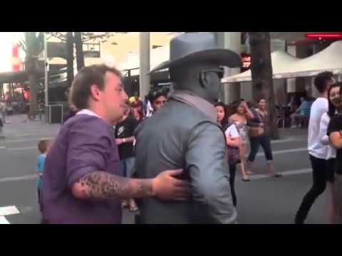 Human ‘Statue’ Punches Prankster
