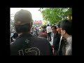 Korea: young man beats up old woman vendor.